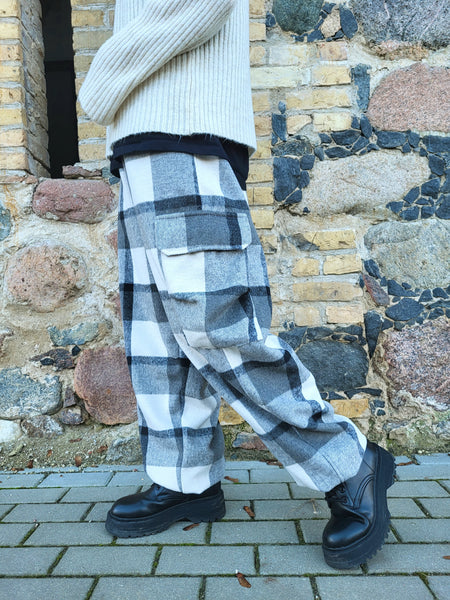 Tartan black and white pants with a plaid pattern