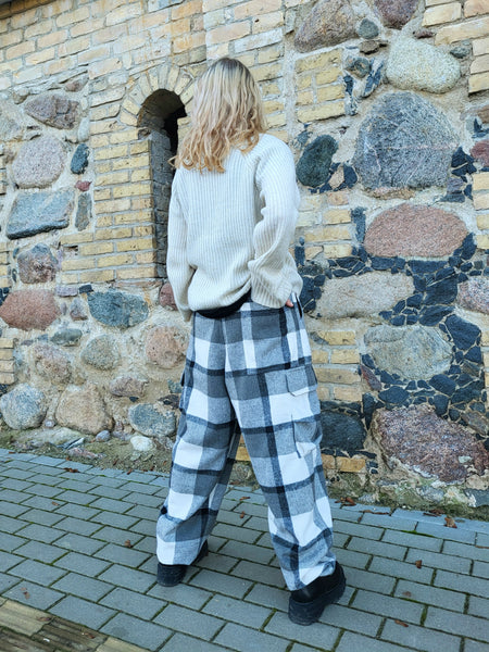 Tartan black and white pants with a plaid pattern