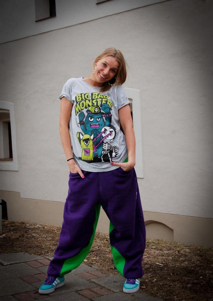 A pair of purple and green sweatpants with a comfortable, relaxed fit.